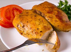 Chicken breasts baked in an oven with foil